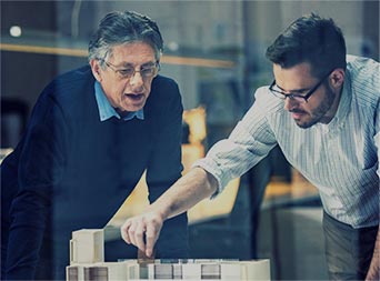 two men reviewing business plans